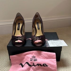 Nina brand used shoes.  Size 5.5 it matches a dress that is my closet for sale.